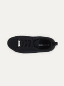 A top-down view of a low-top sneaker. The interior shows a black insole with a partial "CASHMERE", all set against a light gray background. #color_black