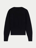 back side black sweater on a light gray background #color_black