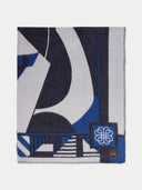 Wool blanket with abstract pattern and brand logo on a white background #color_india-ink