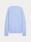 Light blue ribbed sweater on a light gray background #color_light-blue
