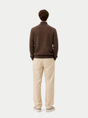back view of a brown sweater and beige pants on a white background #color_cocoa