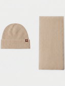 flat lay of a beige beanie and a textured scarf on a light background #color_beige