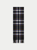 A long black plaid scarf with white, gray, and thin blue and orange stripes, finished with fringe at the bottom, shown on a light gray background.