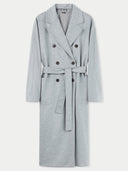 A double breasted long coat with wide notch lapels and a belt, in a light gray color. #color_vapor-blue