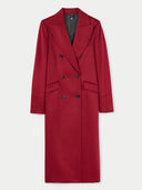 A long red cashmere coat with a peak lapel and double-breasted design, displayed on a mannequin. #color_bordeaux