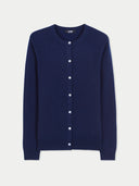Navy blue cardigan with white buttons on a light gray background #color_navy