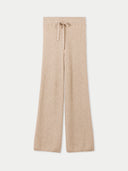A pair of beige textured knit cashmere pants with a ribbed drawstring. #color_warm-grey