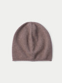 Brown knit beanie on a light gray background #color_taupe