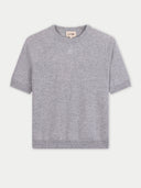 Gray cashmere t-shirt with a brand label on a white background  #color_high-rise