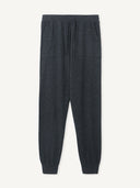 A pair of gray cashmere cuffed jogger pants with a drawstring waistband. #color_charcoal