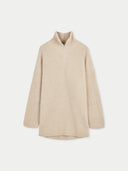 A beige cashmere quarter-zip sweater with a mock neckline and long sleeves. #color_warm-grey
