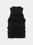 A sleeveless black cashmere vest with loop-stitch details and a high neck. #color_black