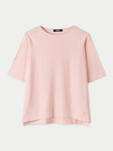 A box-cut cotton silk cashmere blend t-shirt in pink color with a round neckline and short sleeves. #color_primrose-pink