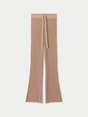 A pair of beige ribbed flare pants with a drawstring waistband, made from a blend of cotton, silk, and cashmere, displayed against a neutral background. #color_timber-wolf