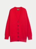 A bright red knit cardigan sweater with a V-neck, long sleeves, and a front button closure, displayed flat against a light gray background. The brand label 'GOBI' is visible inside the collar.