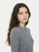 Woman wearing a gray knitted cardigan on a white background #color_all