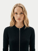 front view of a woman wearing a black ribbed knit cardigan with a zipper on a white background #color_black
