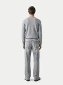 Men's Grey Crewneck Cashmere Sweater worn by model, back view on white background