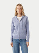 close up front view of a woman wearing a light blue zip-up hoodie on a white background. #color_light-gray