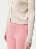 close up of a white lined cardigan #color_whisper-white