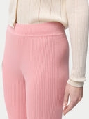 close up of pink ribbed leggings  #color_pink-icing