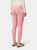 back view of pink leggings and a white top #color_pink-icing