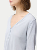 close up of a light blue silk cardigan #color_ice-flow