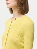 close up of a yellow lined cardigan #color_blazzing-yellow