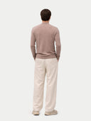 back view of a man wearing a brown sweater and beige pants on a white background #color_timber-wolf
