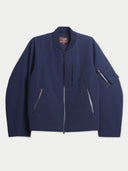 Flat lay of the CashmereTech bomber jacket in crown blue with a ribbed stand collar, full-length zip and zip pockets.