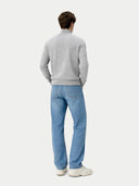 back view of a person wearing a gray sweater and blue jeans on a white background #color_high-rise