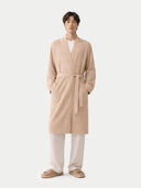 front view of a person wearing a beige bathrobe on a white background #color_beige