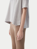 close up bottom side of a gray short sleeve top and ribbed pants #color_wind-chime