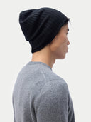 back view of a black beanie and gray shirt on a white background #color_black