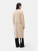 back view of a beige cardigan on a white background #color_beige