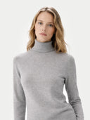 Woman wearing a gray turtleneck sweater on a white background  #color_high-rise