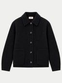 A black wool-blend jacket with a pointed collar, dark buttons, and two front patch pockets, shown flat against a light gray background. A small interior neck label reads GOBI.