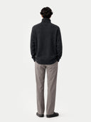 back view of a dark gray sweater and light gray pants on a white background #color_charcoal
