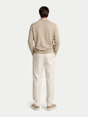 back view of a beige sweater and light-colored pants on a white background #color_warm-grey