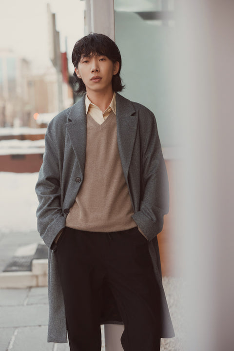 Essential Cashmere V-Neck Sweater in Dark Gray, editorial photo