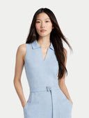 Woman wearing a light blue sleeveless dress against a plain background #color_powder-blue