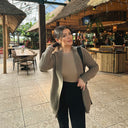 Woman wearing beige open-front cashmere cardigan — @GobiCashmere