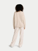 back view of a beige sweater and pants on a white background #color_warm-grey