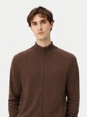 Man wearing a brown zip-up sweater against a white background
 #color_cocoa