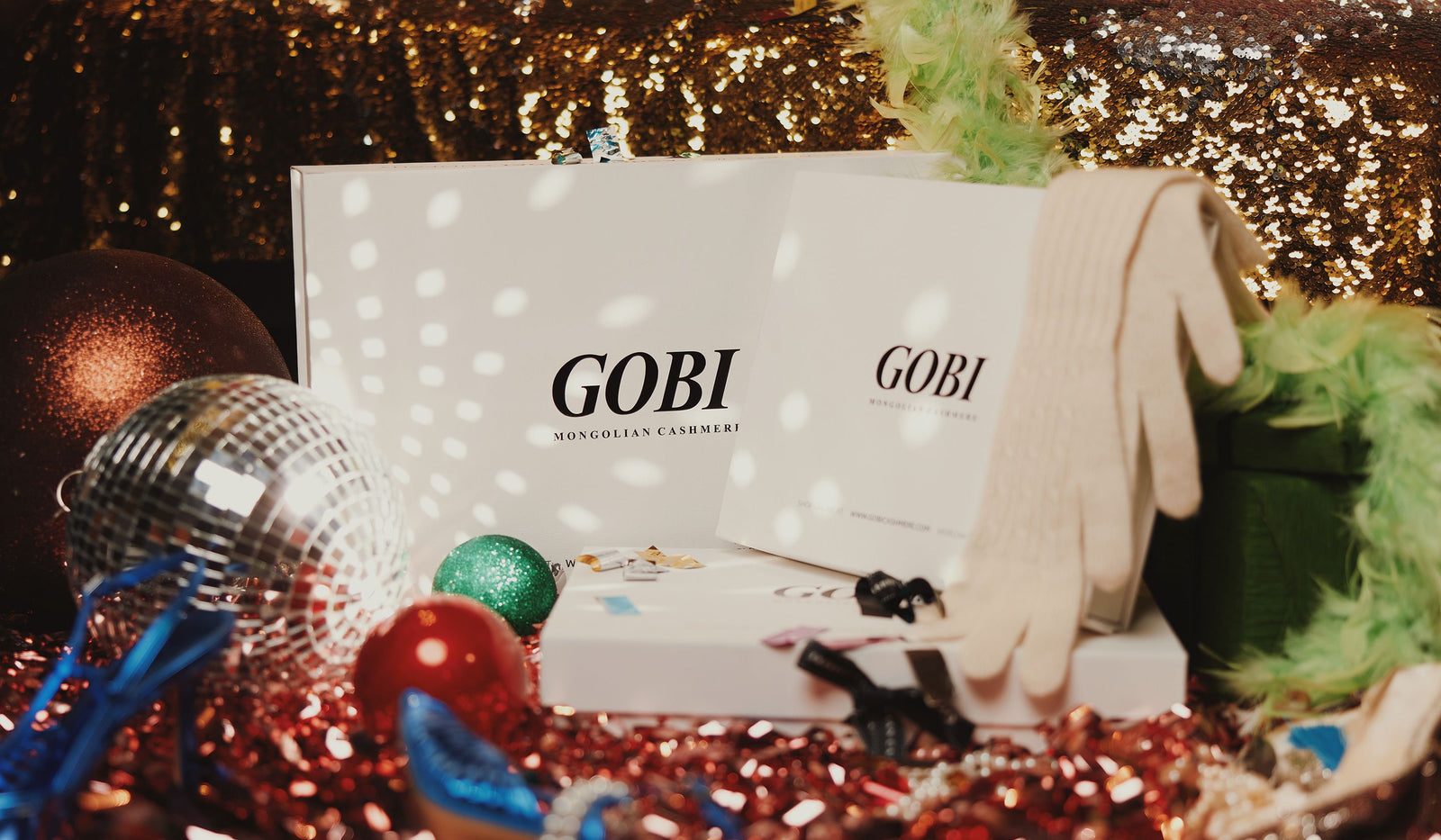 Gobi makeup box with festive decorations on a glittery background. desktop