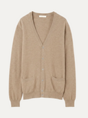 A light beige knit cardigan sweater with a V-neck, button-front closure, and two front patch pockets, shown on a plain light background. #color_taupe