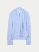 back view of a light blue sweater with a scarf, v-neckline on a white background #color_light blue