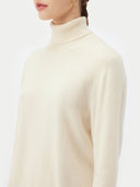 close up of a white turtle neck sweater #color_off-white