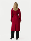back view of a woman wearing a red coat from behind on a white background #color_bordeaux
