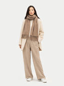 front view of a person wearing a beige scarf, coat, and pants on a white background  #color_taupe